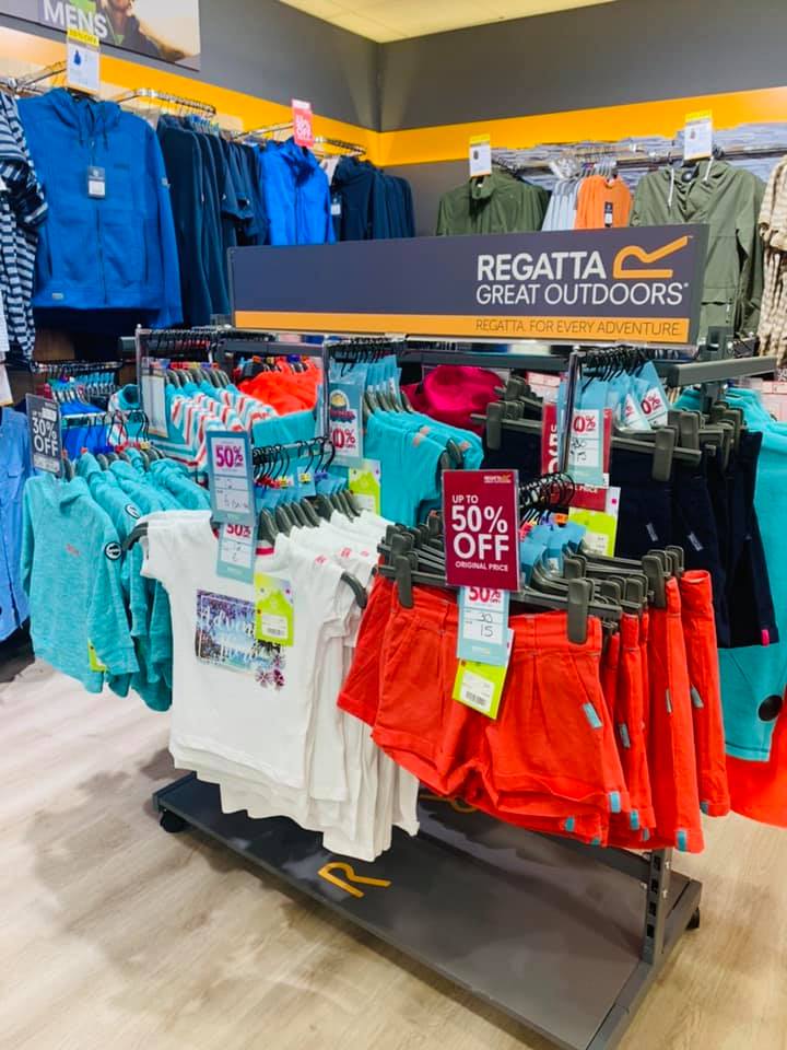 Rack of outdoor clothes in the Regatto store